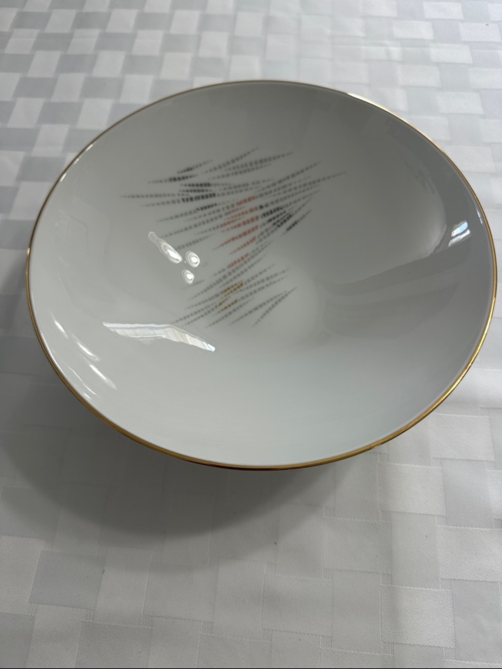 White Porcelain Serving Bowl with Gold Rim and Subtle Accent